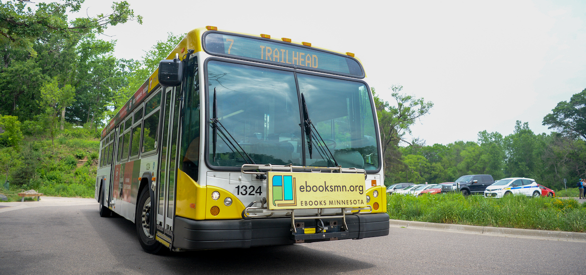 Image of a Route 7 bus in a park environment.