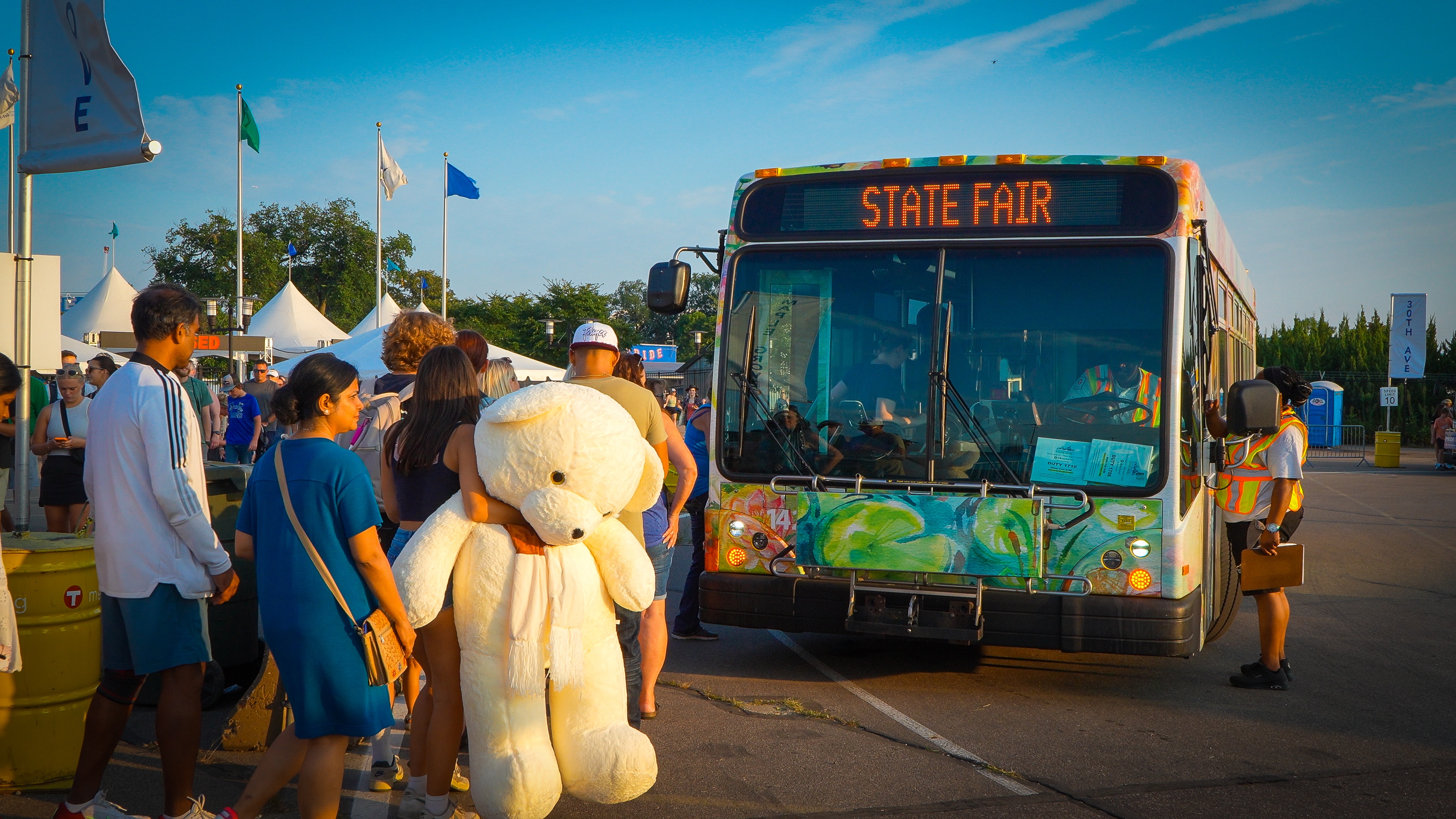 People boarding a Metro Transit State Fair Express Bus at the Minnesota State Fair.