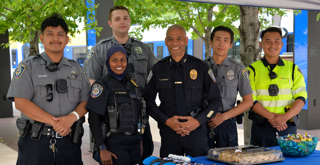 Metro Transit Police officers and community service officers at an outreach event